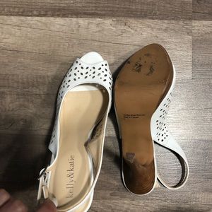 White peep-toe pumps